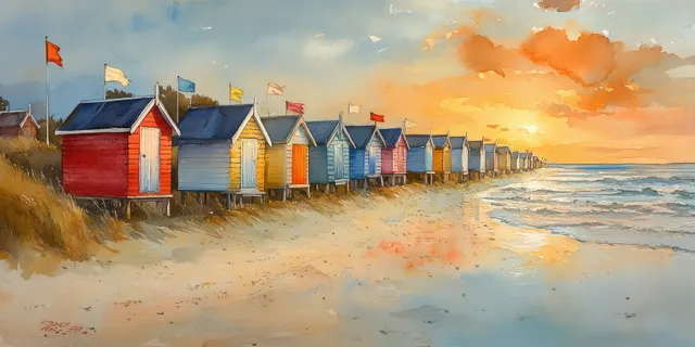 Colorful beach huts with flag poles sit along a sandy shoreline as small waves reach the beach.