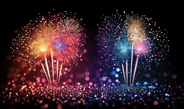 Colorful fireworks explode over a dark night sky with glowing bokeh lights in foreground