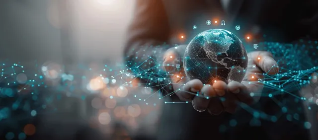 Gloved hand hovering glowing virtual Earth over network lines and digital interface