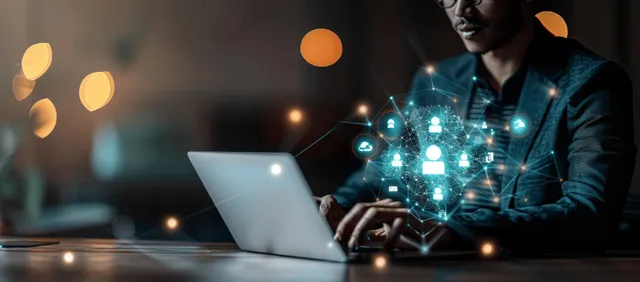 HR professional using laptop to plan recruitment workflows with glowing digital network UI