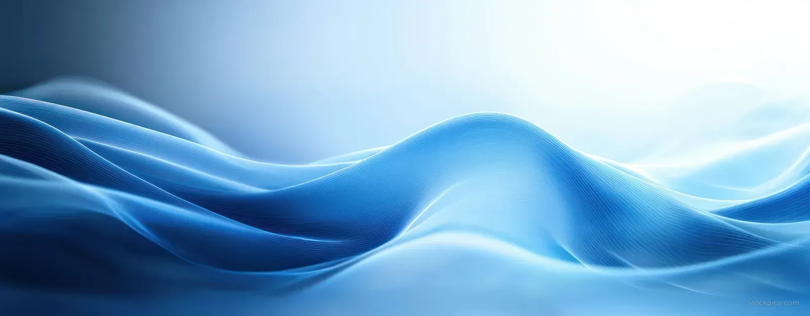 Abstract blue wave background with smooth gradients and soft luminous lighting across flowing curves.