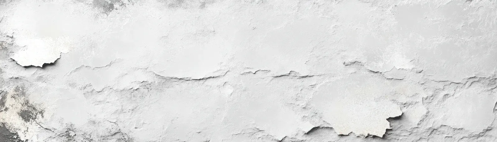 Close-up of a white marble wall texture with gray grunge swirls and visible cracked patches.