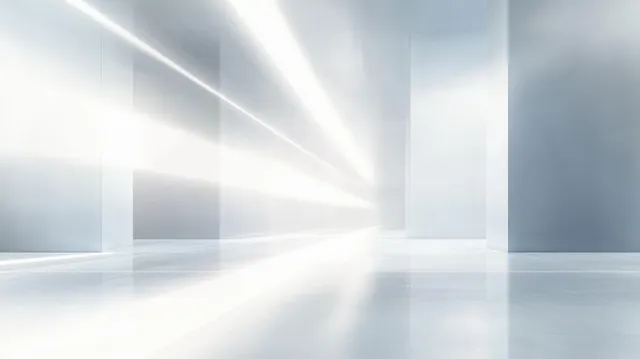 White futuristic corridor with glossy reflective floor and sweeping beams of light across empty space.