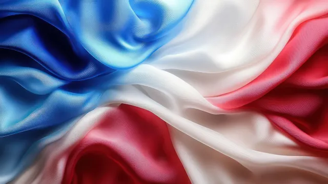 Wavy tricolor silk fabric with Olympic rings and soft flowing folds across a vivid abstract backdrop