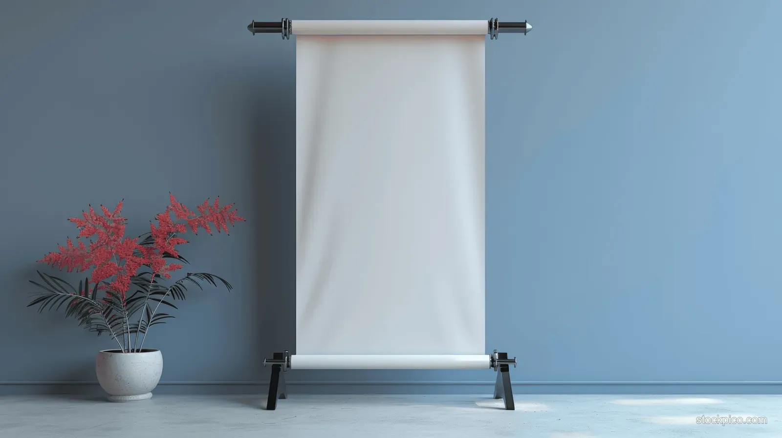 Blank white roll-up banner stand with vertical sheet on a stand beside a small potted plant in a blue studio.