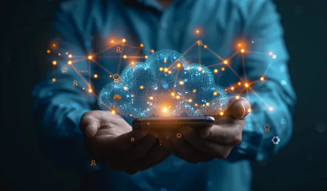 Businessman holding a glowing cloud network icon with secure data transfer lines