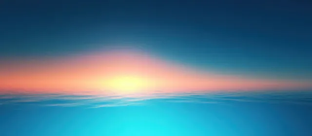Calm ocean horizon with gentle waves reflecting a vibrant sunrise under gradient blue-orange sky