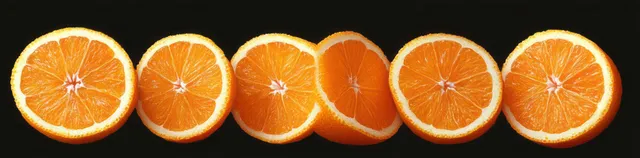 Six orange citrus slices in a row on a black background with juicy texture