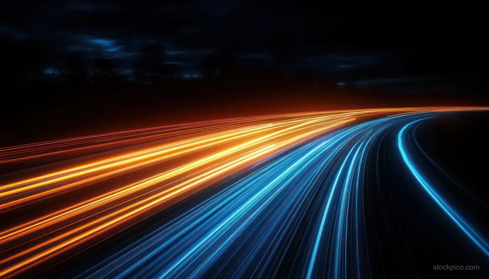 Neon orange and blue light trails curve down a dark cyberpunk highway at night with motion blur.