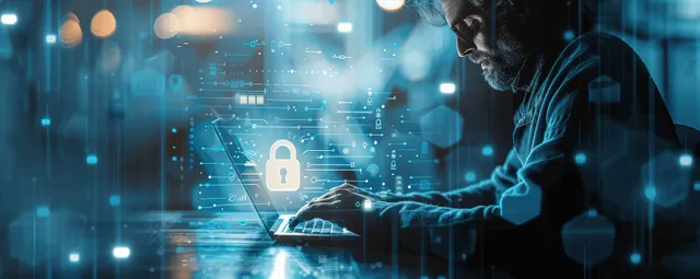 Businessman typing on laptop with padlock overlay securing smartphone transactions