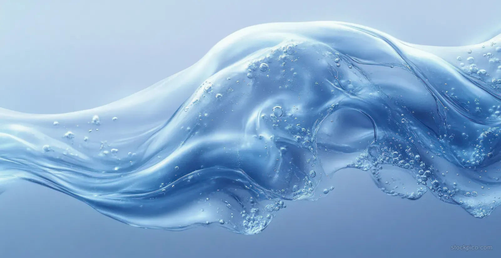 Transparent blue liquid wave with suspended bubbles flows across a soft blue gradient background.