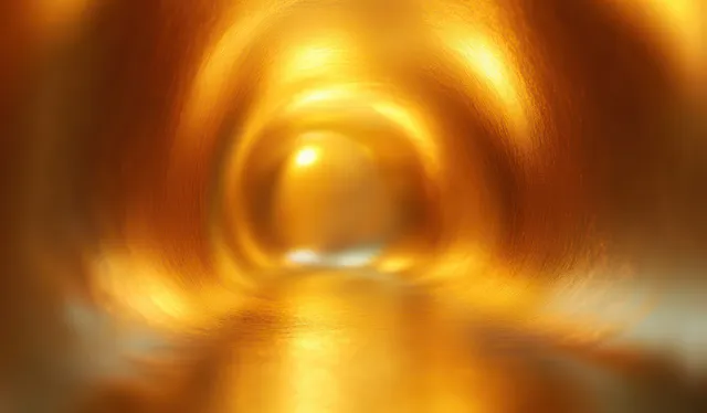 A golden glowing tunnel corridor with smooth reflective walls and warm light gradients fading into the distance.