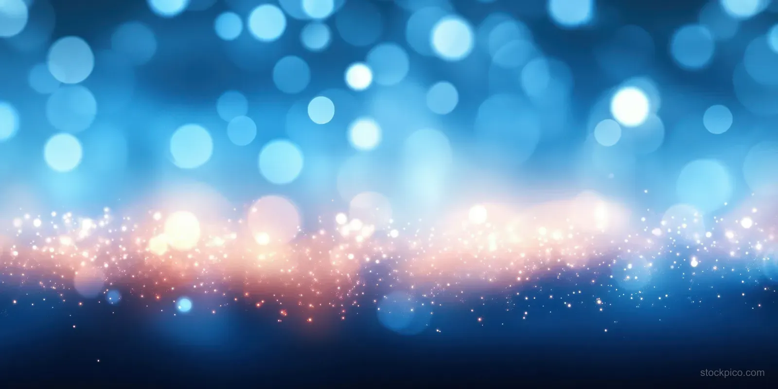 Blue bokeh lights shimmer across a blurred seaside horizon with glowing sunlight specks and soft haze.