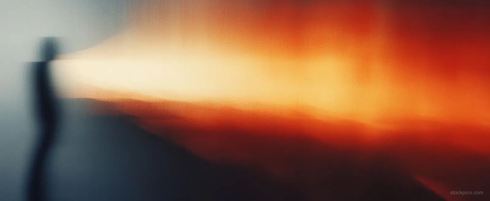 Abstract warm orange and cool gray gradient background with blurred edges and soft chiaroscuro glow.