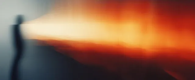 Abstract warm orange and cool gray gradient background with blurred edges and soft chiaroscuro glow.