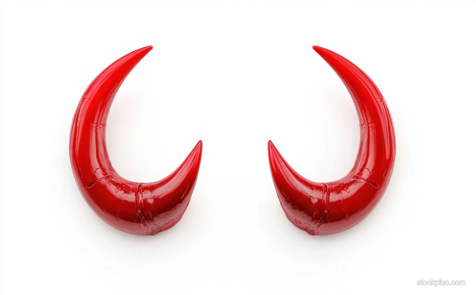 Shiny red curved devil horns isolated on a clean white background.