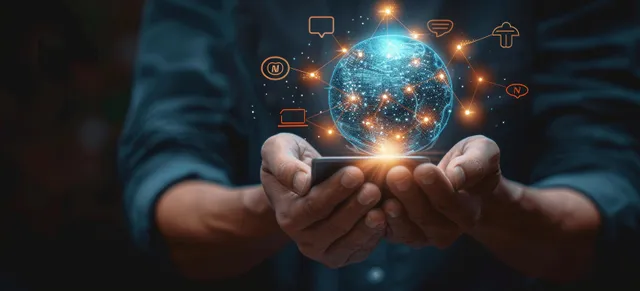Businessman holding glowing hologram world while laptop chat bubble AI connects network