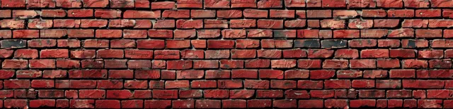 Weathered red brick wall panorama with horizontal copy space and rough masonry texture