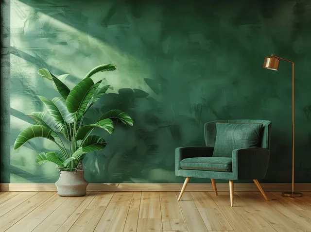 Minimalist green living room corner with armchair, potted plant, and warm wooden floor with Green Accent Wall