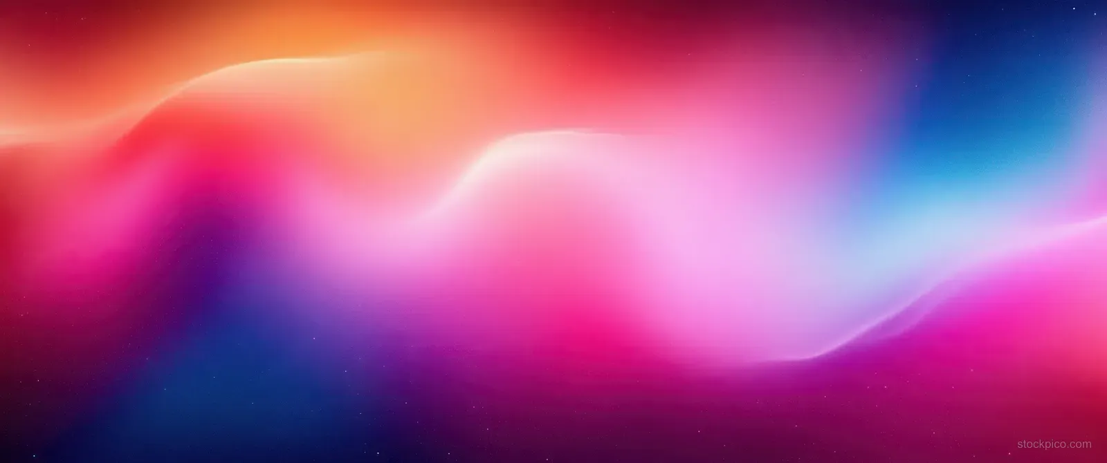 Blurred abstract background with smooth pink, blue, and orange color swirls and soft glowing haze.