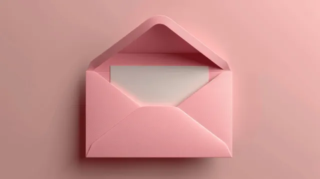 Open pink envelope with blank white card on pastel background, top view