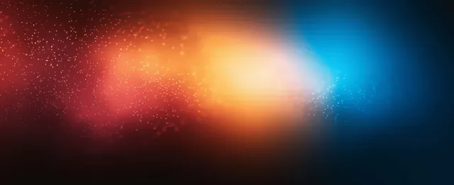 A vibrant abstract background with a colorful gradient and grainy texture, featuring flowing light effects.