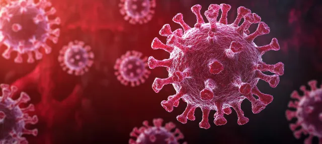 Red 3D coronavirus particles with spike proteins float in a dark microscopic infection visualization.