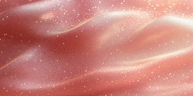 Rose-gold glitter specks and soft bokeh shimmer over a warm champagne gradient abstract background.