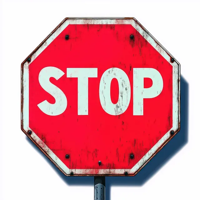 Weathered red octagonal stop sign with white STOP letters and rusty edges centered on a white background.