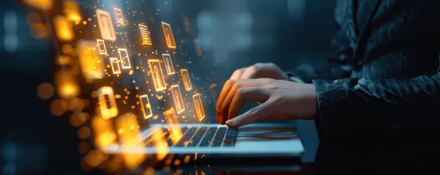 Hands typing on laptop while digital document icons flow across a networked interface