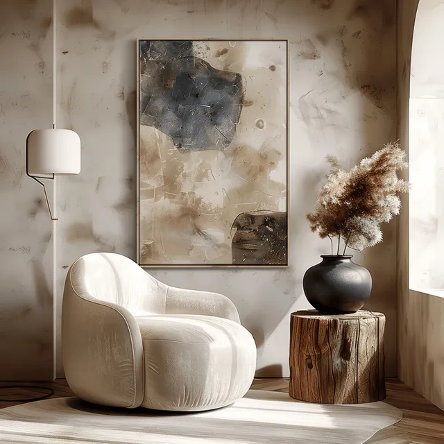 Beige armchair and wooden side table in a minimalist living room under soft natural window light with abstract artwork.