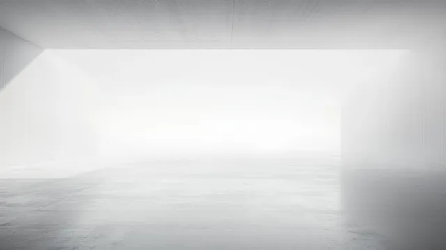 Empty white room with a smooth reflective floor and bright daylight from a large opening.