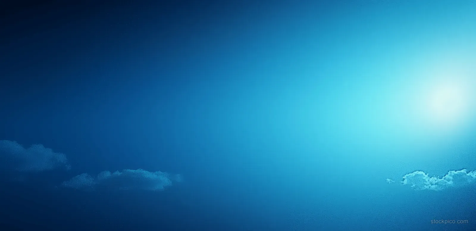 Blue gradient background with a bright glow in the upper right and faint cloud-like texture along the bottom.