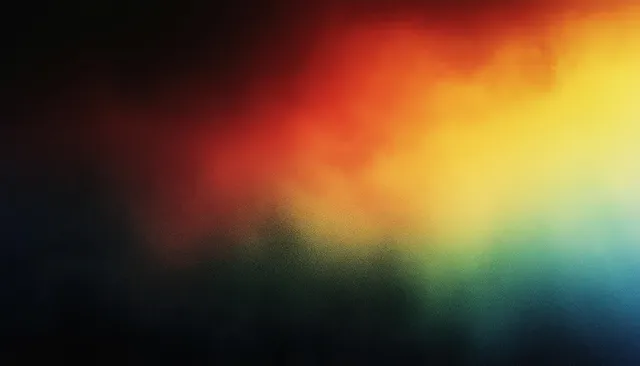 Abstract blurred gradient background blending orange, green, and blue glows with soft diffused lighting.