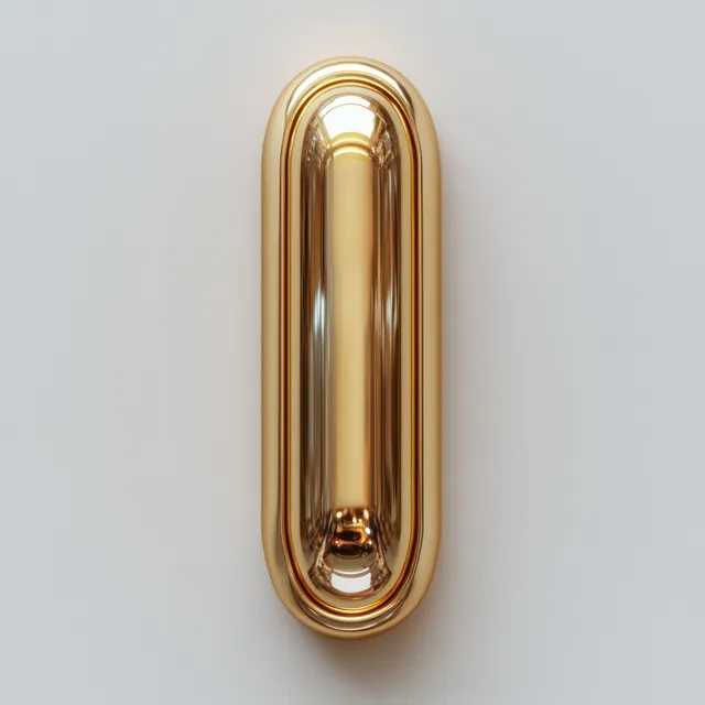 A gold paperclip is isolated on a white background in close-up macro detail.