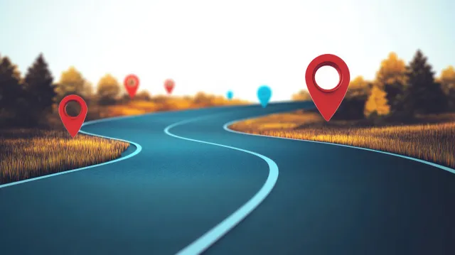 A winding asphalt road through autumn fields shows red and blue location pins marking points along the route.