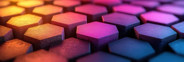 Colored pencil tips arranged in hexagonal pattern forming a colorful 3D gradient with purple and warm red tones.