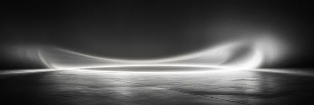 Monochrome light wave ribbons sweep horizontally above a textured reflective surface with a soft vertical gradient.