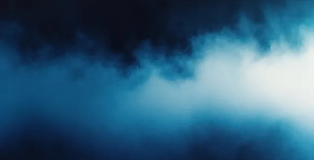 Midnight blue to light azure blurred gradient with soft glow and smoky texture