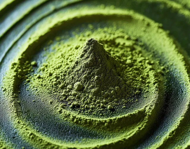Close-up green powder mound on textured surface with concentric ring patterns