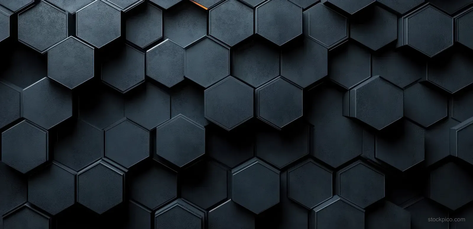 Dark gray and black hexagonal pattern with depth and shadows creates a textured, futuristic surface.