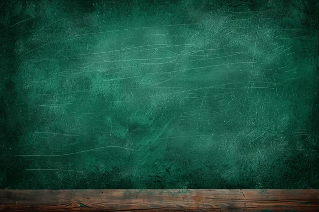 Smudged green chalkboard background with worn texture and empty writing space