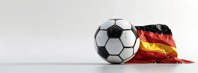 Soccer ball with waving German flag on seamless white studio backdrop with copy space