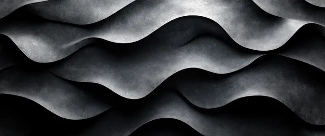 Close-up de uma textura de parede cinza com relevos ondulados de gesso e sulcos suavemente sombreados.