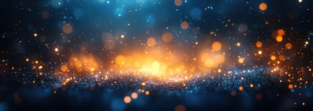 Vibrant blue and yellow Christmas lights glow in dreamy bokeh at night