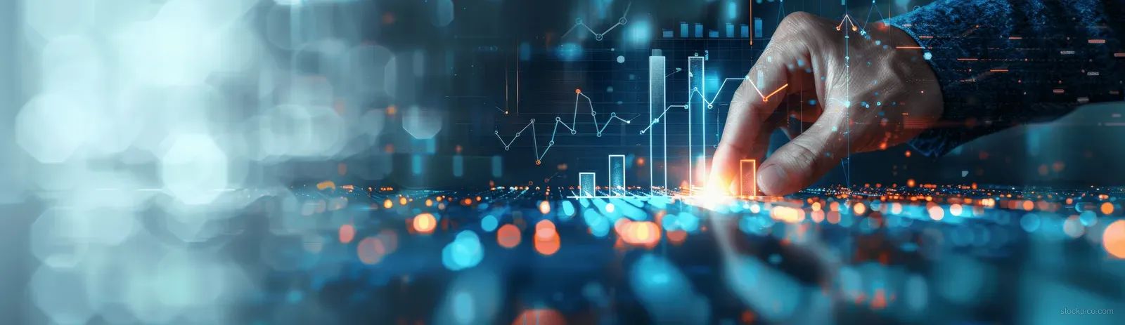A hand taps a glowing digital chart showing financial data on a futuristic market screen.