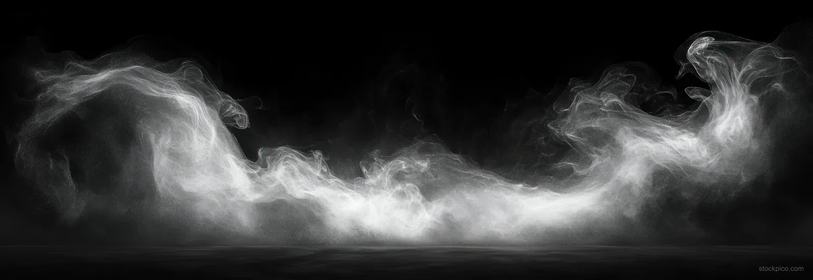 White smoke mist swirls into smooth plumes against a deep black background with visible wispy trails.