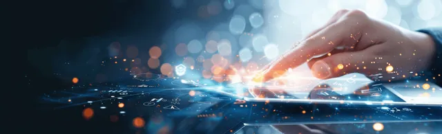 Hands of a businessman use a tablet showing futuristic sales analytics with glowing network overlays at night.