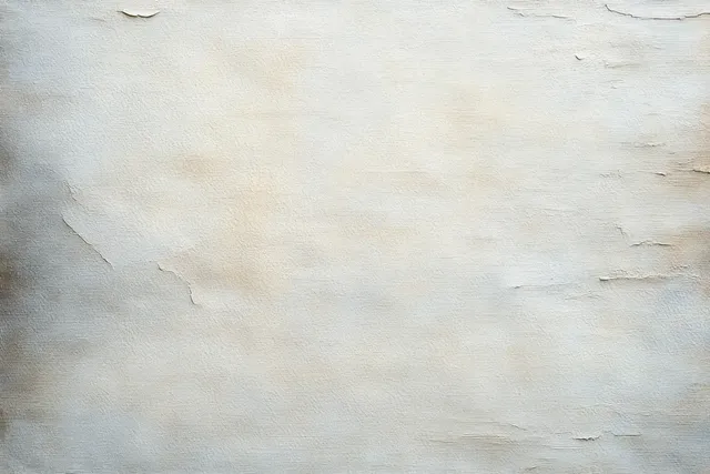 Close-up of an old wall with peeling paint and weathered discoloration on a rough surface.