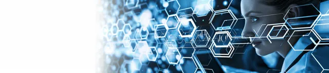 Engineer working at computers with hexagon data overlay, cloud network and analytics